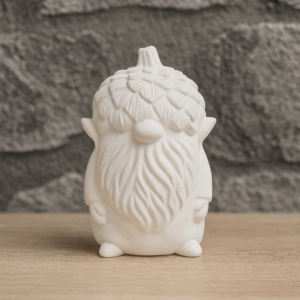 Willi Wichtel mit dem oberen Teil einer Eichel auf dem Kopf